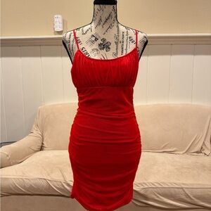 Stretchy red Steve Madden dress. Lines with soft mesh ruched fabric overlay.